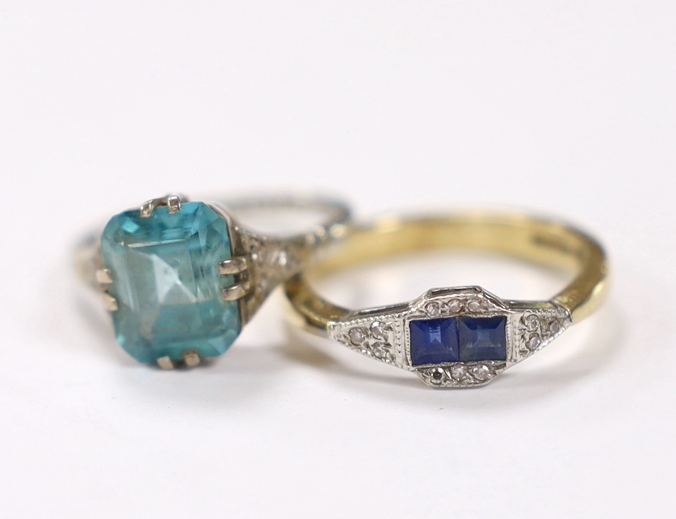 An Art Deco 18ct, plat and blue zircon set ring, with diamond chip set shoulders, size L, together with a modern Art Deco style 9ct gold, sapphire and diamond set ring, gross weight 6.7 gram.